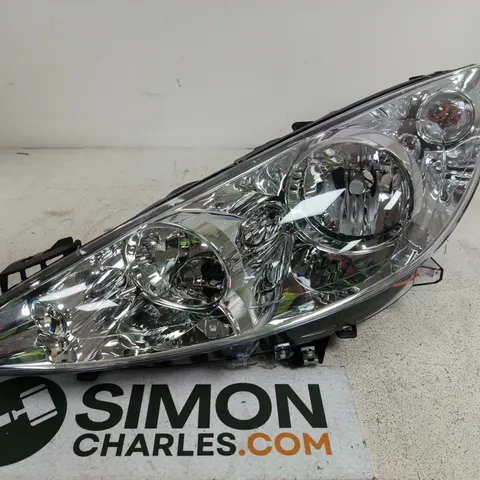 VEHICLE FRONT HEADLIGHT ASSEMBLY - MODEL UNSPECIFIED
