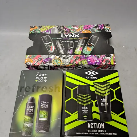 APPROXIMATELY 3 ASSORTED COSMETIC BOXSETS TO INCLUDE - UMBRO ACTION TOILETRIES SET - DOVE MEN REFRESH DUO - LYNX GAME TIME BODYSPRAY SET