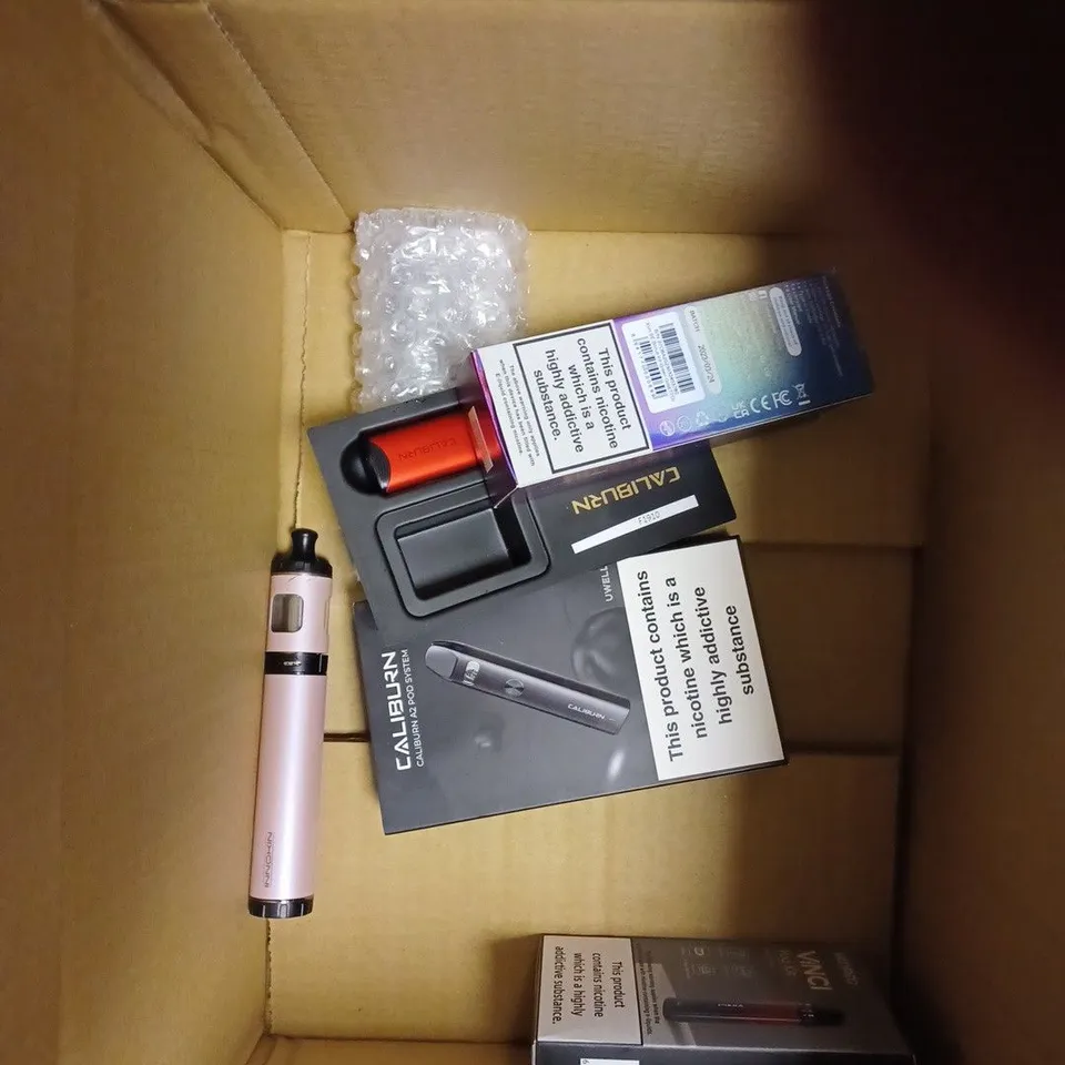 BOX OF APPROX 10 ITEMS TO INCLUDE VAPORESSO XROS 3 MINI, OXVA XLIM SE, CALIBURN A2. 