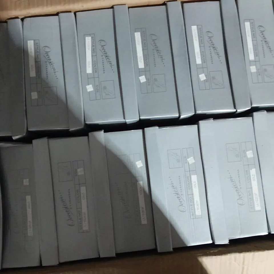 APPROXIMATELY 12 BOXED PAIR OF CASANDRA HEELED SANDALS IN GOLD VARIOUS SIZES