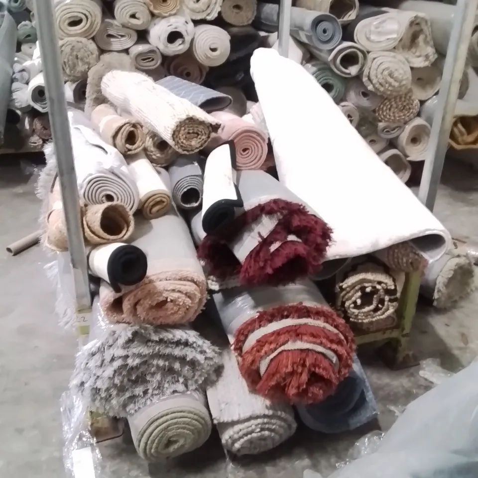 STILLAGE OF APPROXIMATELY 20 QUALITY DESIGNER RUGS