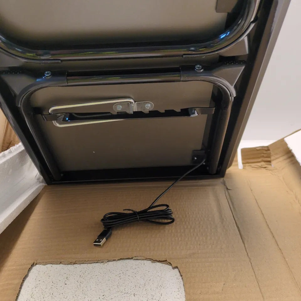 SMALL TABLE WITH CHARGERS AND WIRING 