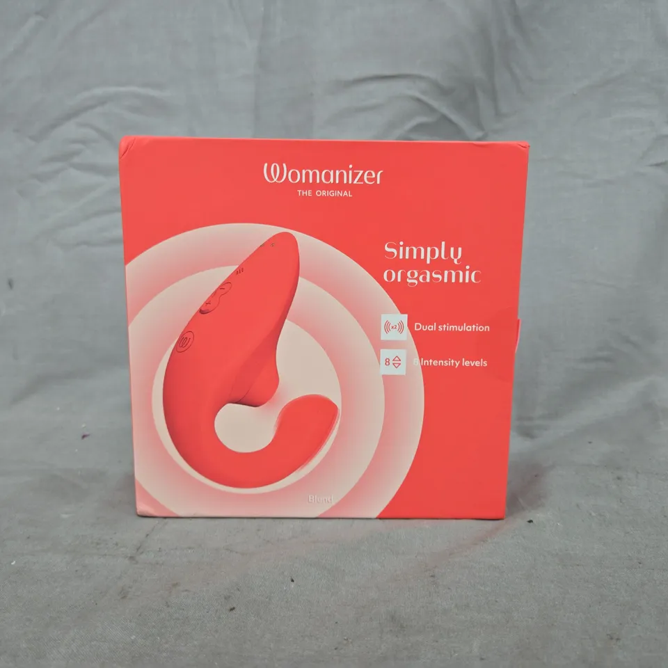 BOXED WOMANIZER STIMULATOR IN VIBRANT ROSE COLOUR
