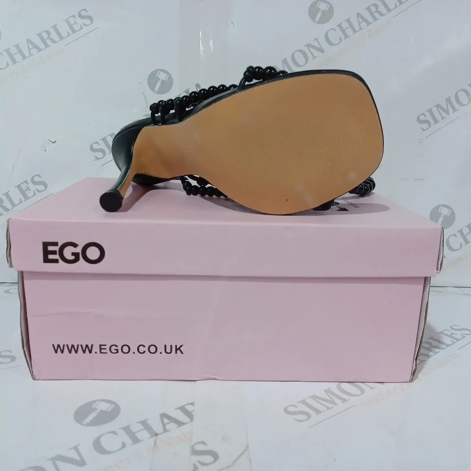 BOXED PAIR OF EGO OPEN TOE HIGH HEEL SANDALS IN BLACK W. BEADED EFECT UK SIZE 4
