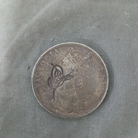 APPROXIMATELY 10 INDIAN SILVER ONE RUPEE COINS