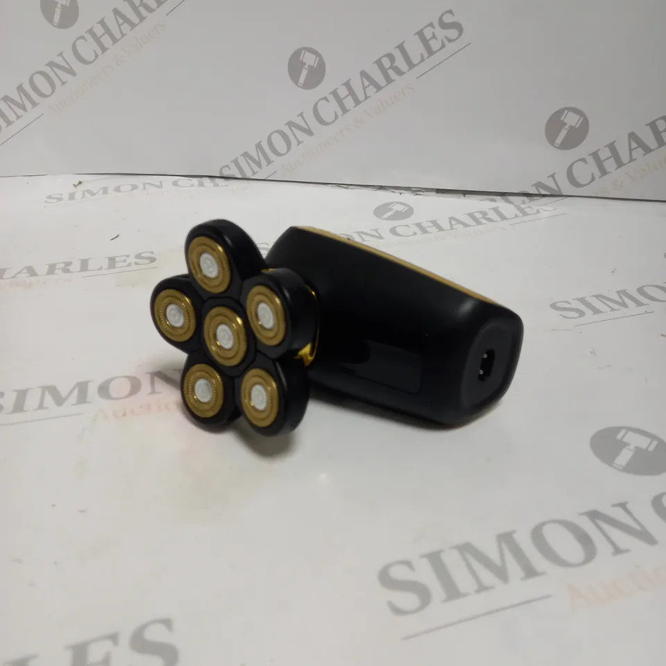 BOXED HANDHELD ELECTRIC SHAVER. 