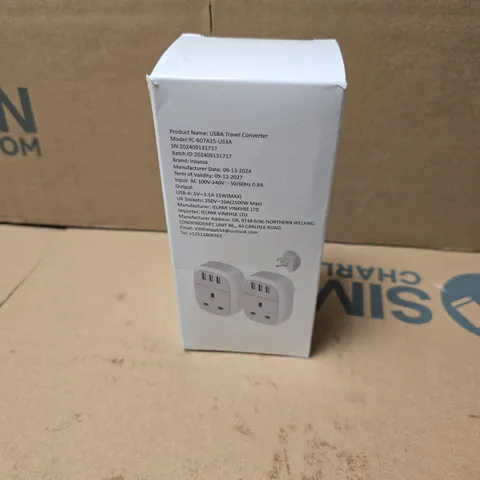 APPROXIMATELY 20 BOXED UK TO US ADAPTOR PLUGS 