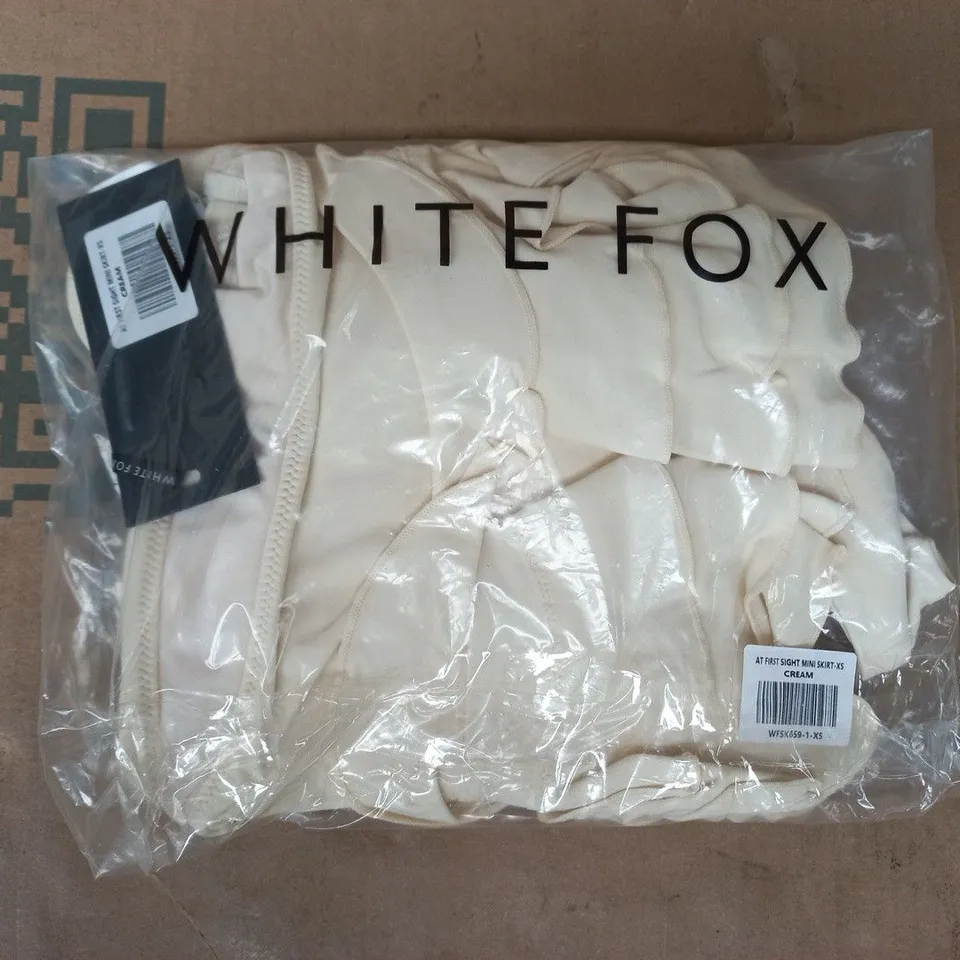 BAGGED WHITE FOX AT FIRST SIGHT MINI SKIRT IN CREAM SIZE XS