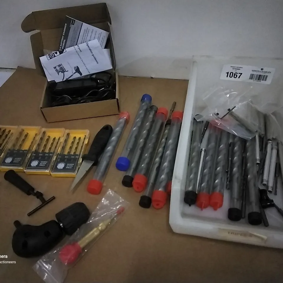 TRAY OF ASSORTED DRILL BITS, INCLUDING LEFT HAND SETS, ELECTRIC BIKE CHARGER, ANGLED DRILL CHUCK.