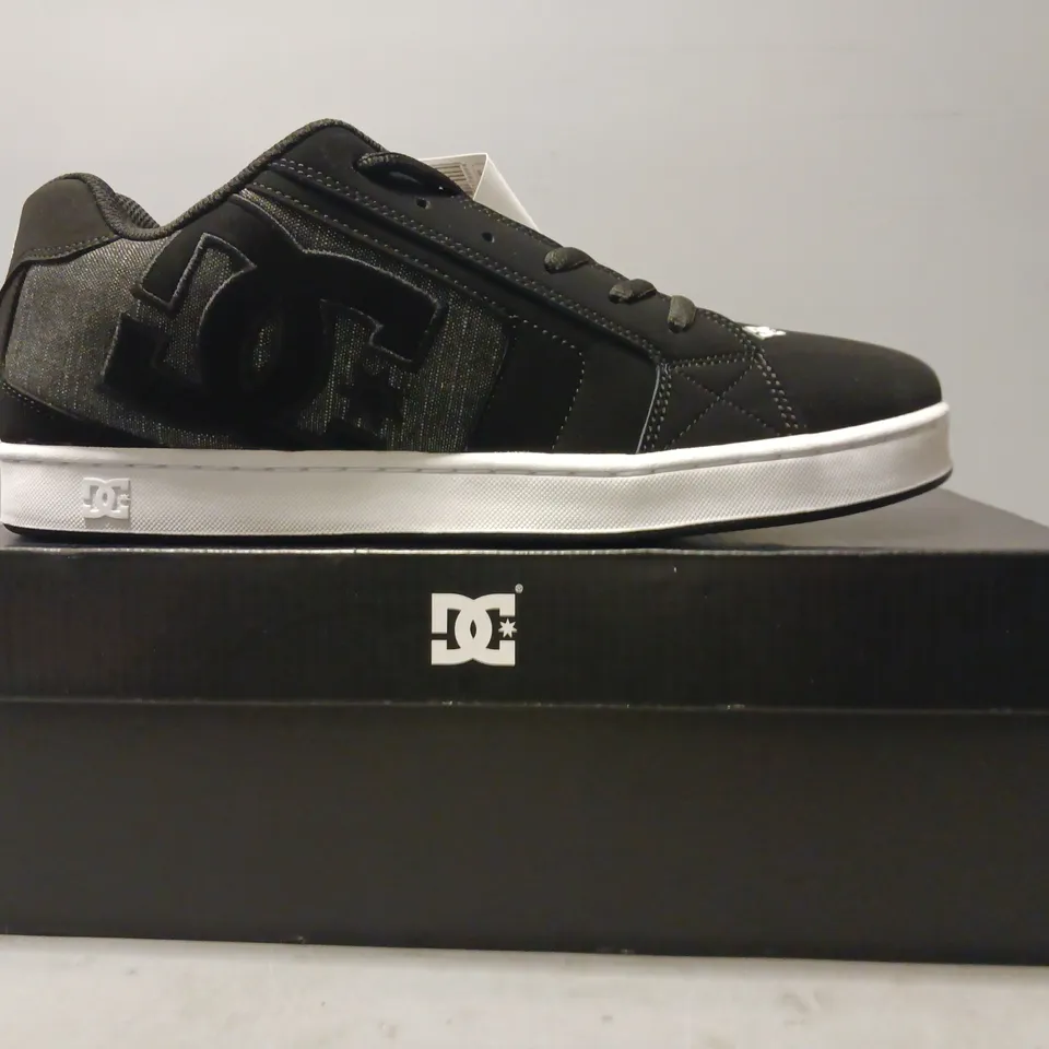 BOXED PAIR OF DC SHOES IN BLACK UK SIZE 11.5