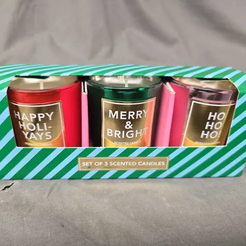 4 X BOXED CHRISTMAS THEMED SCENTED CANDLES - 3 CANDLES PER PACK