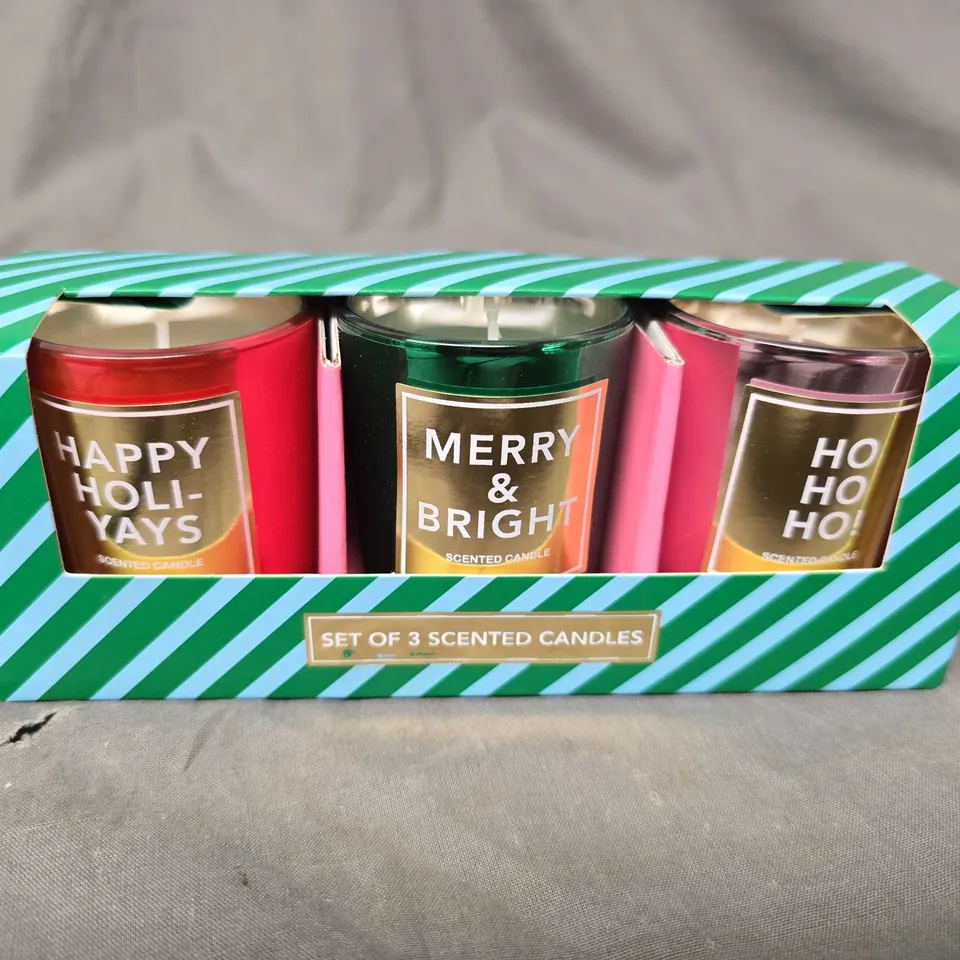 4 X BOXED CHRISTMAS THEMED SCENTED CANDLES - 3 CANDLES PER PACK 
