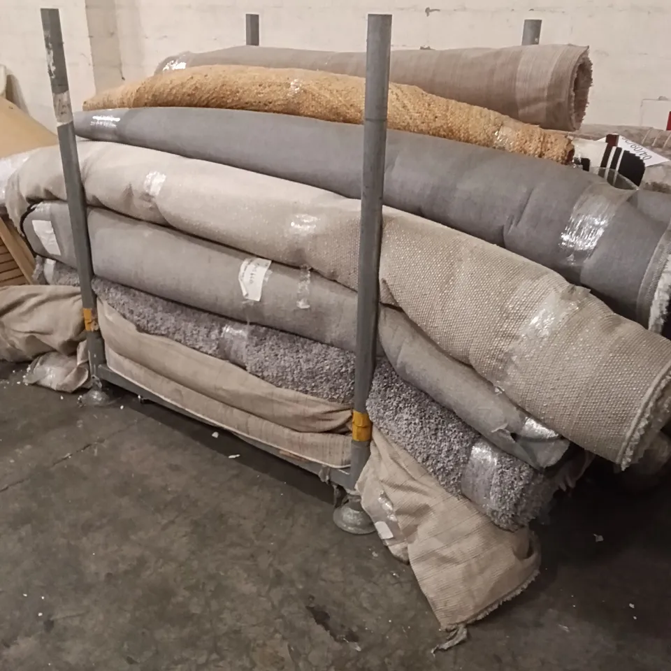 STILLAGE OF DESIGNER RUGS APPROXIMATELY 14 LARGE RUGS