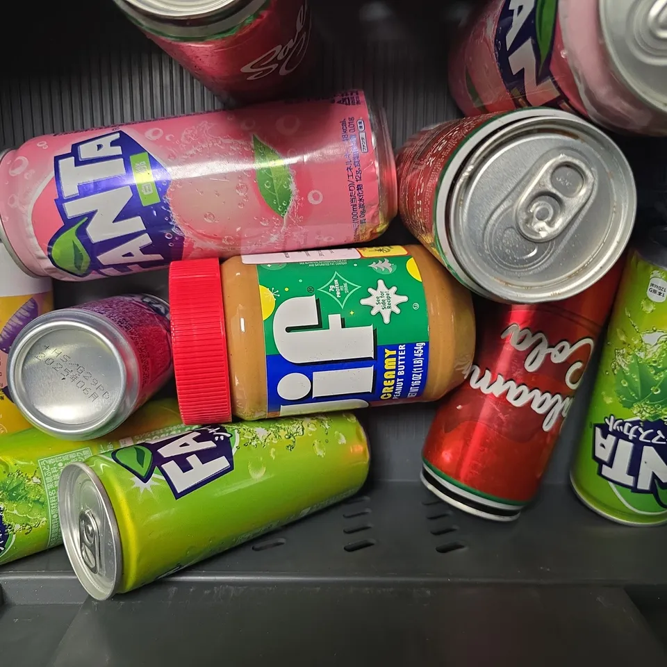 APPROXIMATELY 13 ASSORTED FOOD & DRINK ITEMS TO INCLUDE - FANTA , JIF , SALAAM COLA ETC