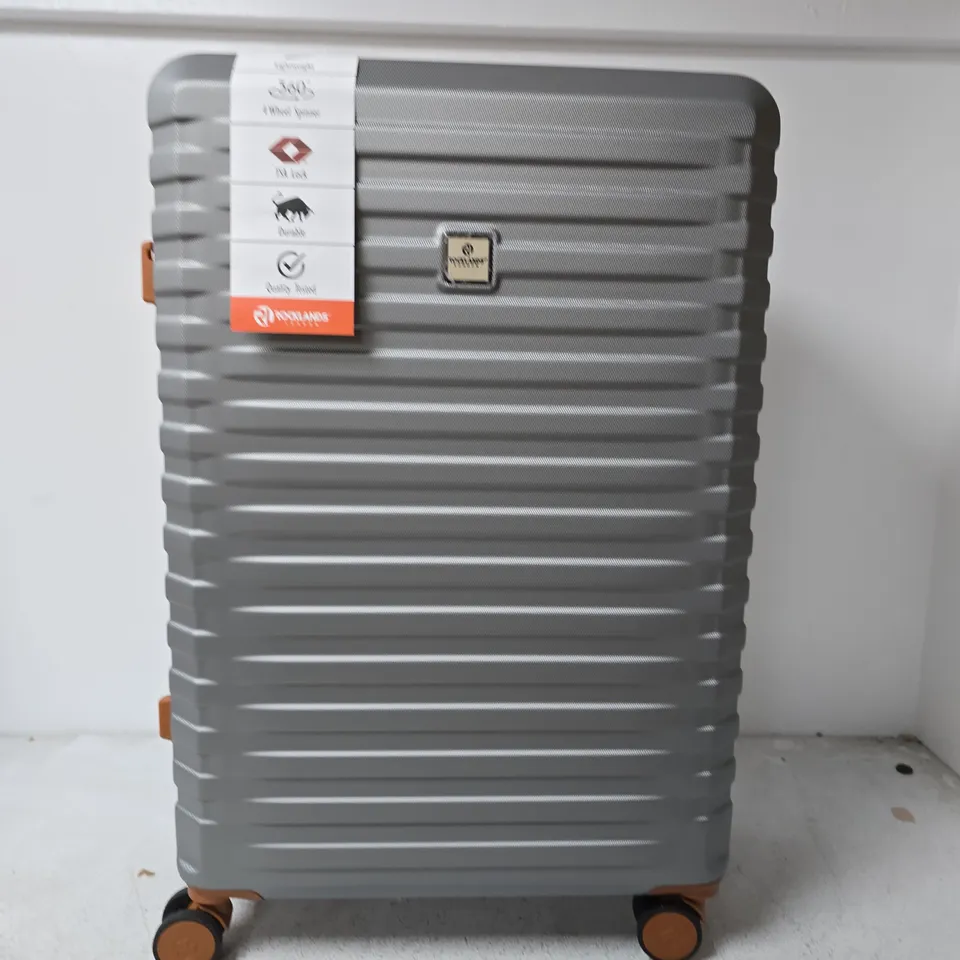 ROCKLANDS SILVER HARD-SHELL SUITCASE WITH FOUR SPINNER WHEELS