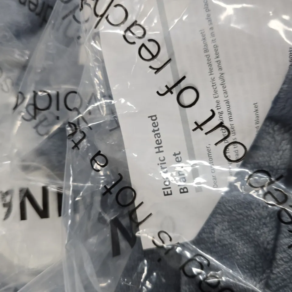 BLUE ELECTRIC HEATED BLANKET – FOLDED IN CLEAR PACKAGING 