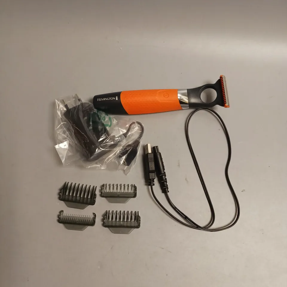 BOXED REMINGTON DUALBLADE BEARD TRIMMER IN ORANGE AND BLACK INCLUDES 4 COMBS