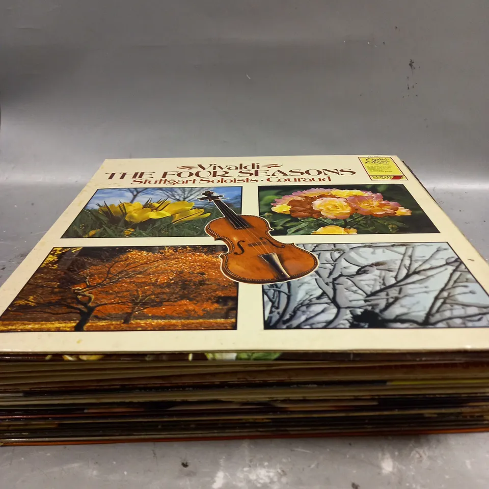 APPROXIMATELY 20 ASSORTED VINYLS TO INCLUDE CHARTBUSTERS 69, COUNTRY SINGERS, SPARTACVS ETC