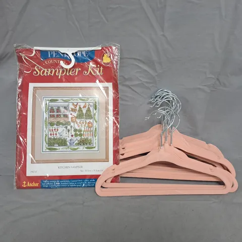 BOX OF APPROXIMATELY 10 ASSORTED HOUSEHOLD ITEMS TO INCLUDE SAMPLER KIT, UNBRANDED PINK HANGERS, ETC - COLLECTION ONLY