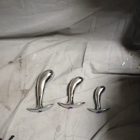 SET OF 3 METAL BUTT PLUGS WITH PURPLE JEWEL 