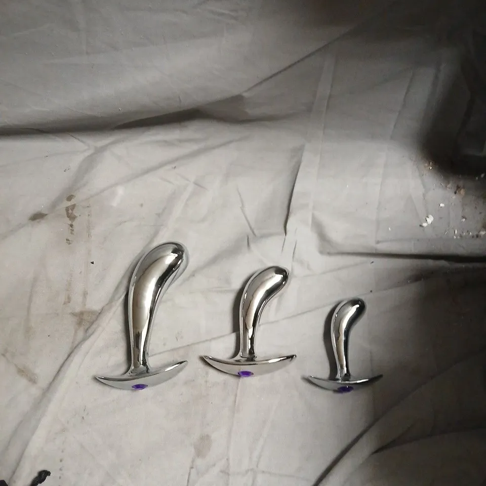 SET OF 3 METAL BUTT PLUGS WITH PURPLE JEWEL 