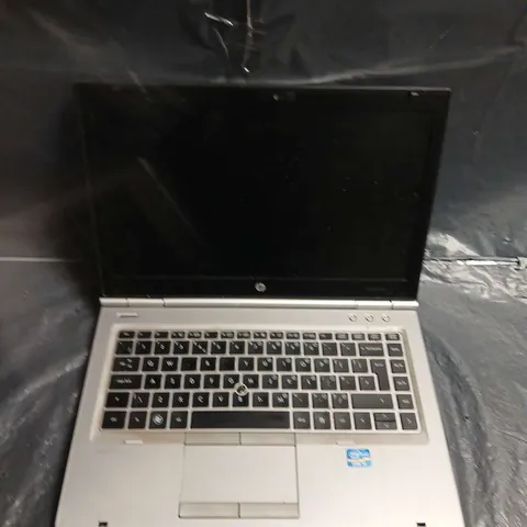 HP LAPTOP – SILVER - MODEL UNSPECIFIED