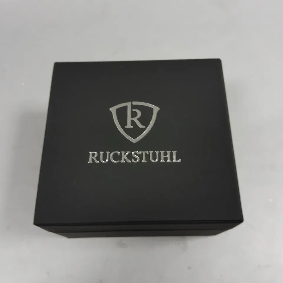 MENS RUCKSTUHL BLACK DIAL WATER RESISTANT WATCH WITH STAINLESS STEEL CASE AND RUBBER STRAP IN GIFT BOX