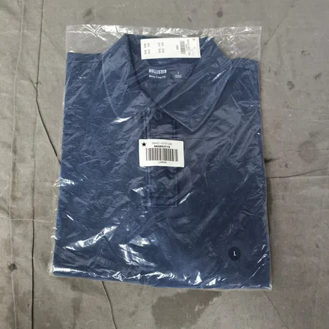 BAGGED HOLLISTER BOXY CROP FIT POLO TOP IN NAVY SIZE LARGE