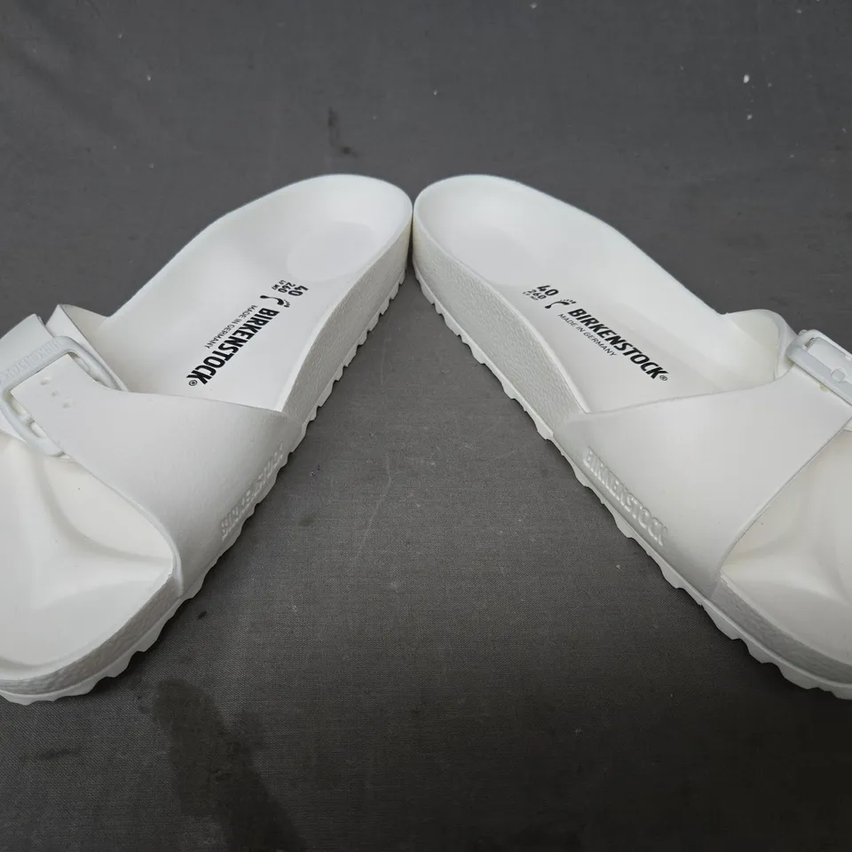 BOXED PAIR OF BIRKENSTOCK MADRID EVA SLIDERS IN WHITE UK SIZE 7