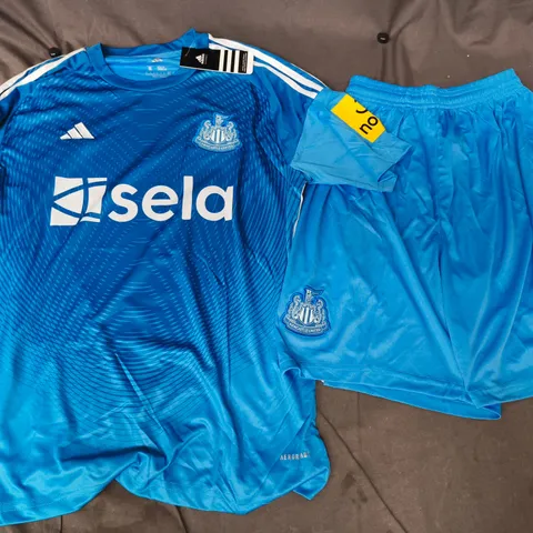 ADIDAS NEWCASTLE UNITED FOOTBALL KIT IN BLUE SIZE MEDIUM