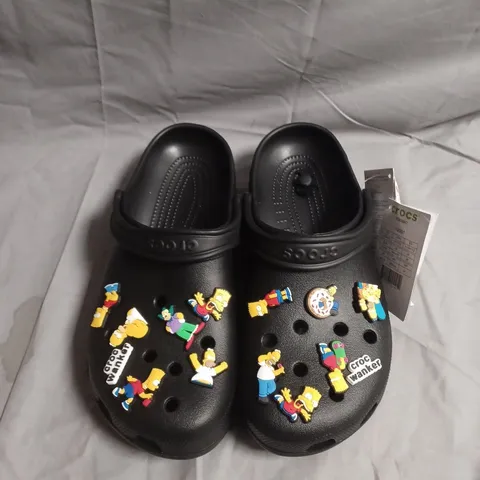 PAIR OF CROCS CLASSIC CLOGS WITH SIMPSONS CHARACTERS - UK SIZE M9 / W10