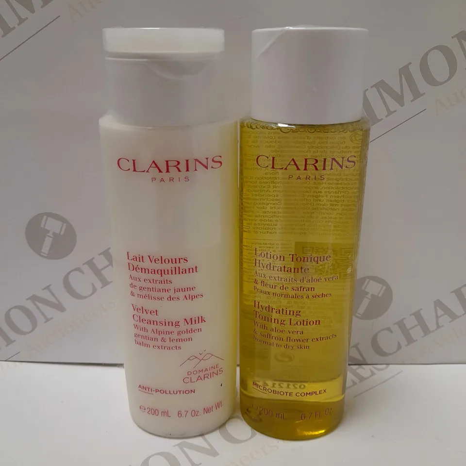 LOT OF 2 CLARINS PRODUCTS TO INCLUDE VELVET CLEANSING MILK 200ML & HYDRATING TONING LOTION 200ML 