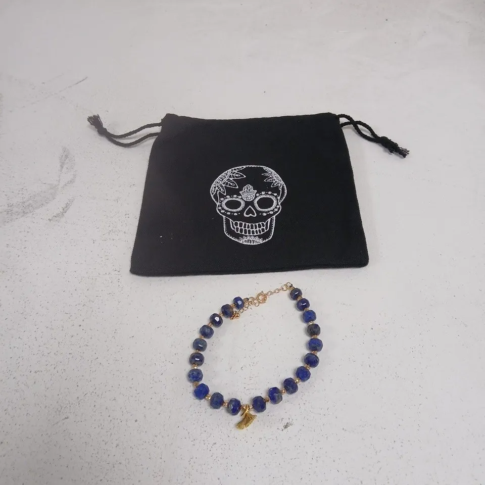BLUE BEAD BRACELET WITH GOLD-TONE CLASP, WITH SKULL-PRINT POUCH