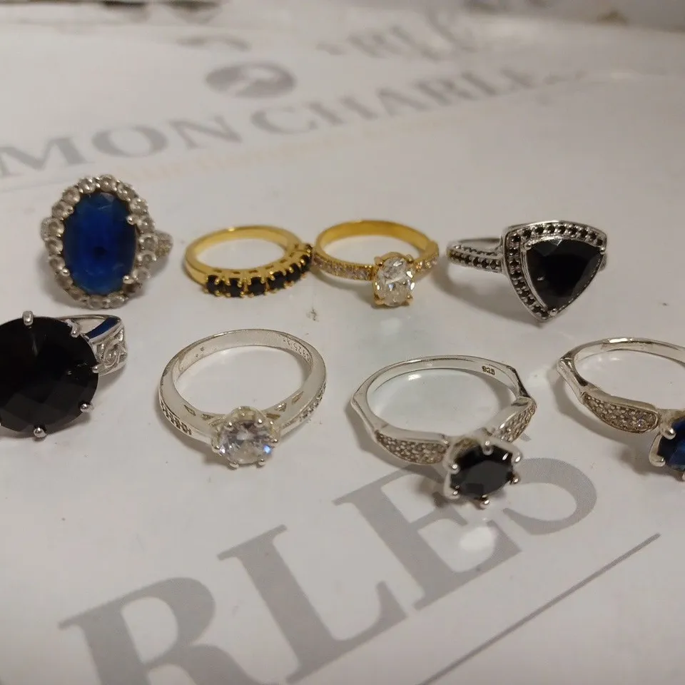 8 ASSORTED LOOSE RINGS IN VARIOUS STYLES 