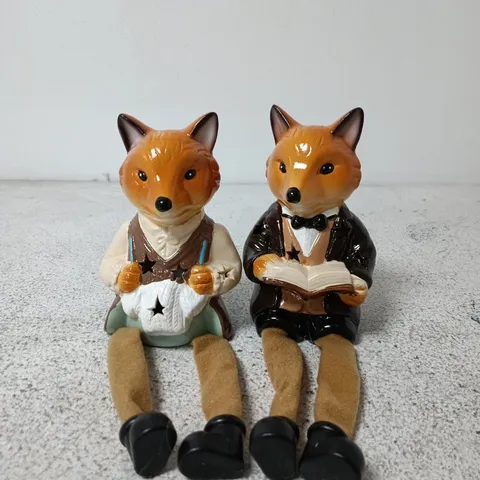 HOME REFLECTION SET OF 2 DANGLY LEG CHARACTERS