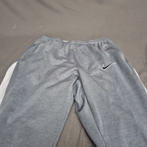 NIKE DRI FIT LIGHT GREY TRACKSUIT PANTS - LARGE