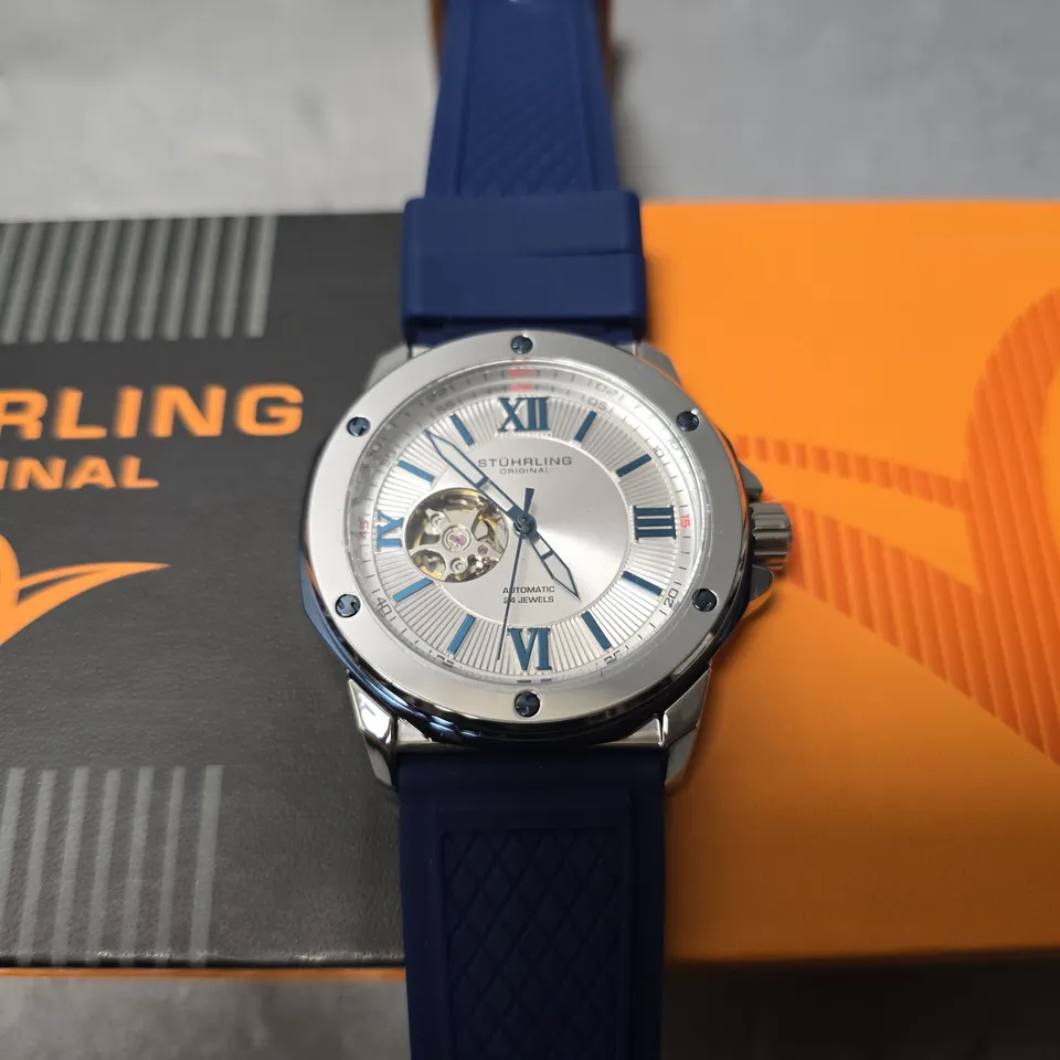BOXED STUHRLING EDWARDIAN AUTOMATIC 44MM SKELETON WATCH
