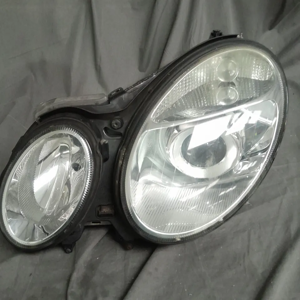 MERCEDES E-CLASS  HEAD LIGHT HOUSING - COLLECTION ONLY 