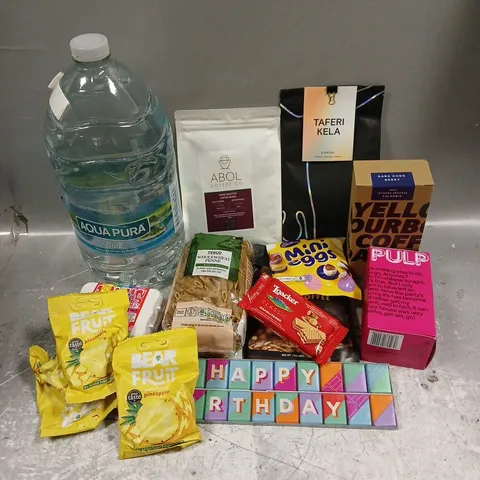 APPROXIMATELY 12 ASSORTED FOOD & DRINK ITEMS TO INCLUDE - CADBURY MINI EGGS - AQUA PURA STILL WATER - M&S HAPPY BIRTHDAY CHOCOLATE - ETC - COLLECTION ONLY