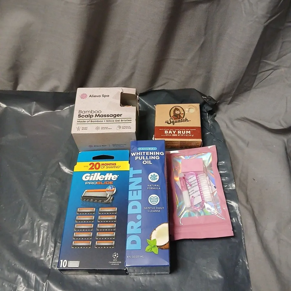 APPROXIMATELY 20 ASSORTED COSMETICS INCLUDING DR SQUATCH DEODORANT, GILLETTE RAZORS, WHITENING PULLING OIL, BAMBOO SCALP MASSAGER ETC