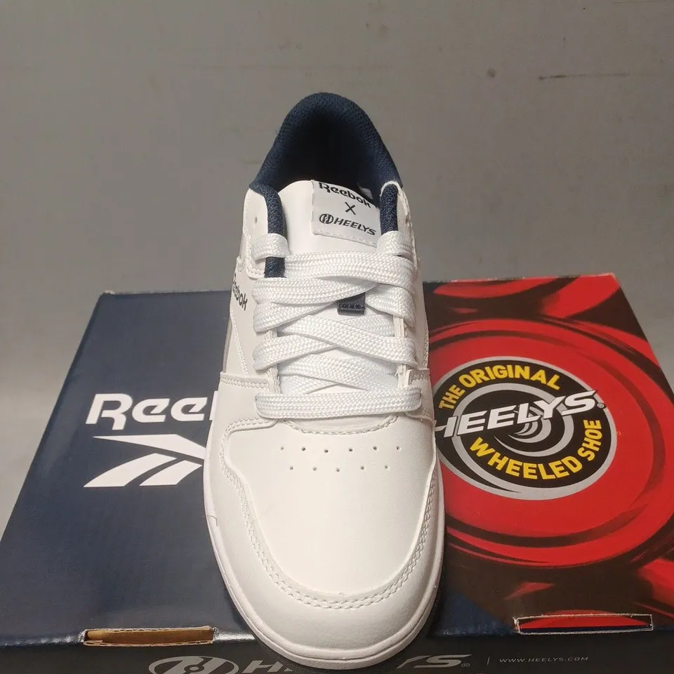 BOXED PAIR OF REEBOK HEELYS - UK SIZE 2