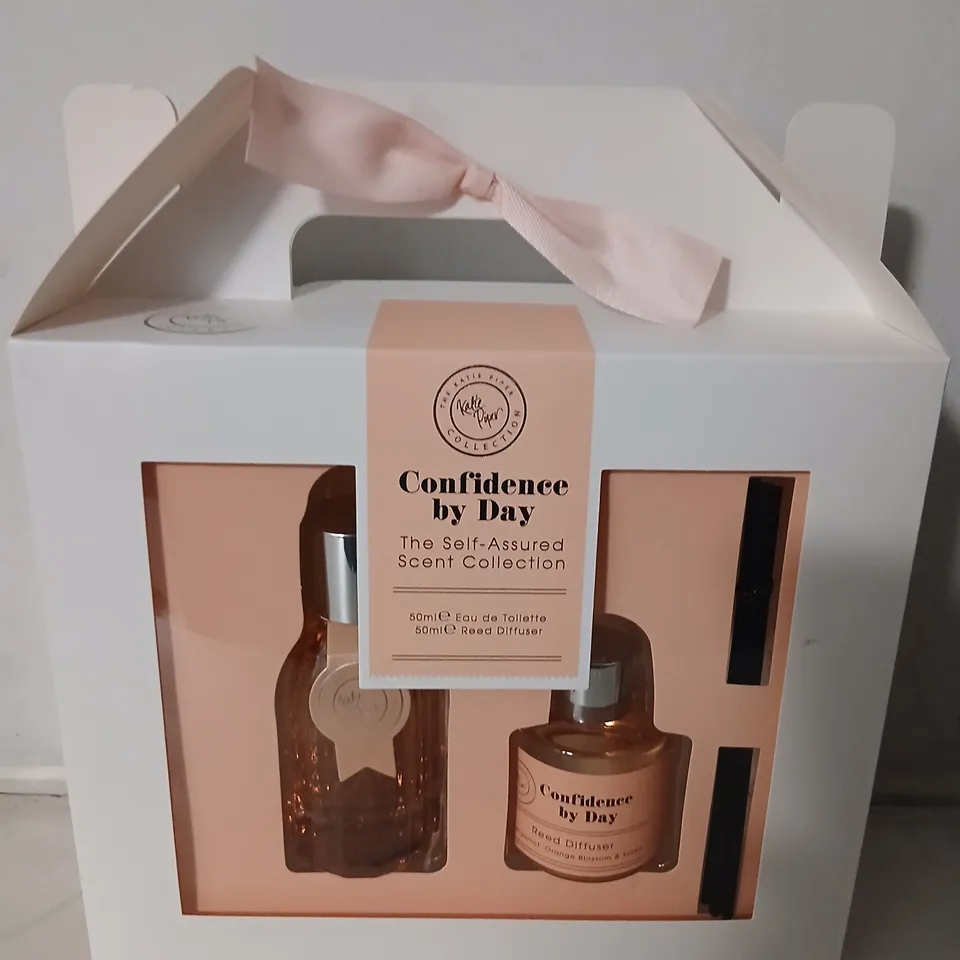 PALLET OF APPROXIMATELY 180 CONFIDENCE BY DAY – SELF-ASSURED SCENT COLLECTION (50ML EAU DE TOILETTE + 50ML REED DIFFUSER) – KATIE PIPER FOUNDATION