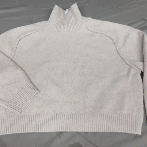 H&M KNITTED HIGH NECK JUMPER IN NATURAL - EUR L