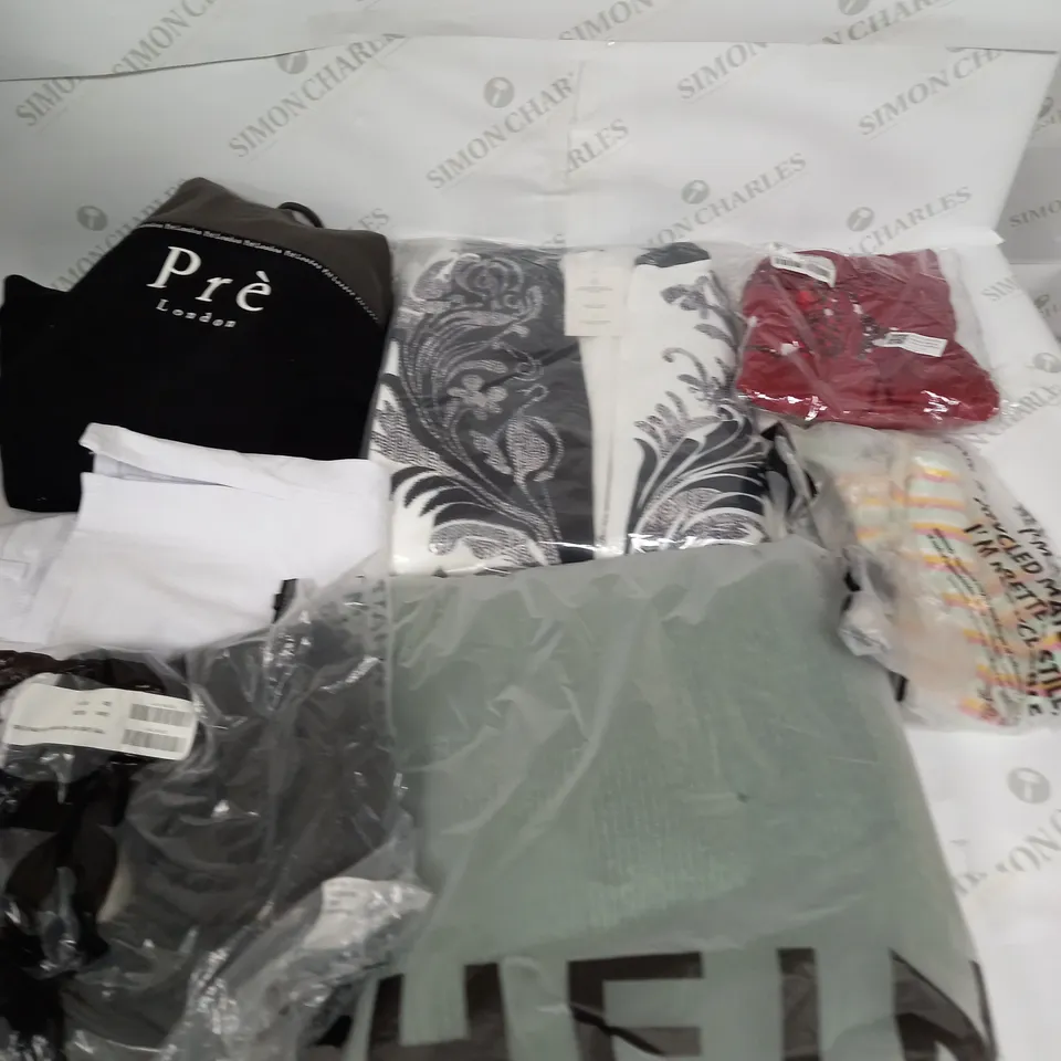 LARGE BOX OF ASSORTED CLOTHING ITEMS IN VARIOUS COLOURS AND SIZES INCLUDING TROUSERS , TOPS AND JUMPERS