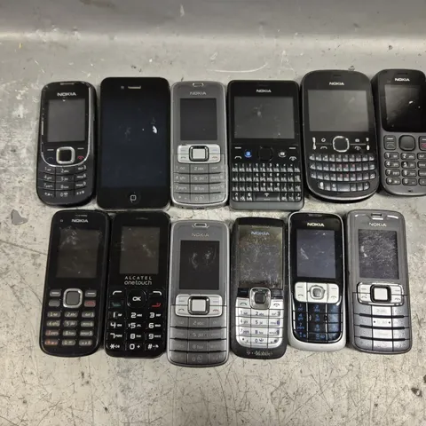 APPROXIMATELY 12 ASSORTED PHONES TO INCLUDE IPHONE A1387, ALCATEL ONE TOUCH, NOKIA 2630, ETC