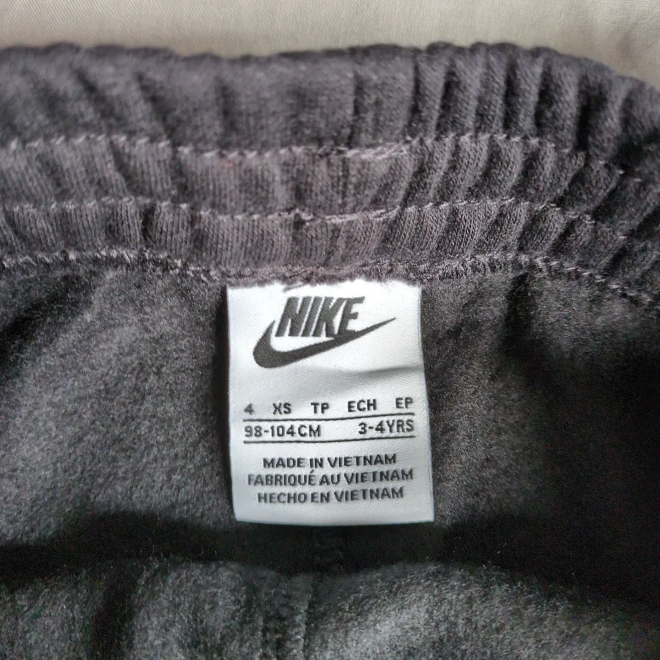 NIKE KIDS' BLACK JOGGERS WITH PINK SWOOSH – UK 3-4 YEARS