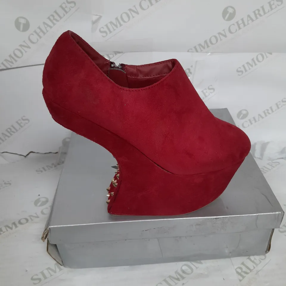 BOXED PAIR OF CASSANDRA PLATFORM SHOE IN RED SUEDE WITH GOLD SPIKES SIZE 6