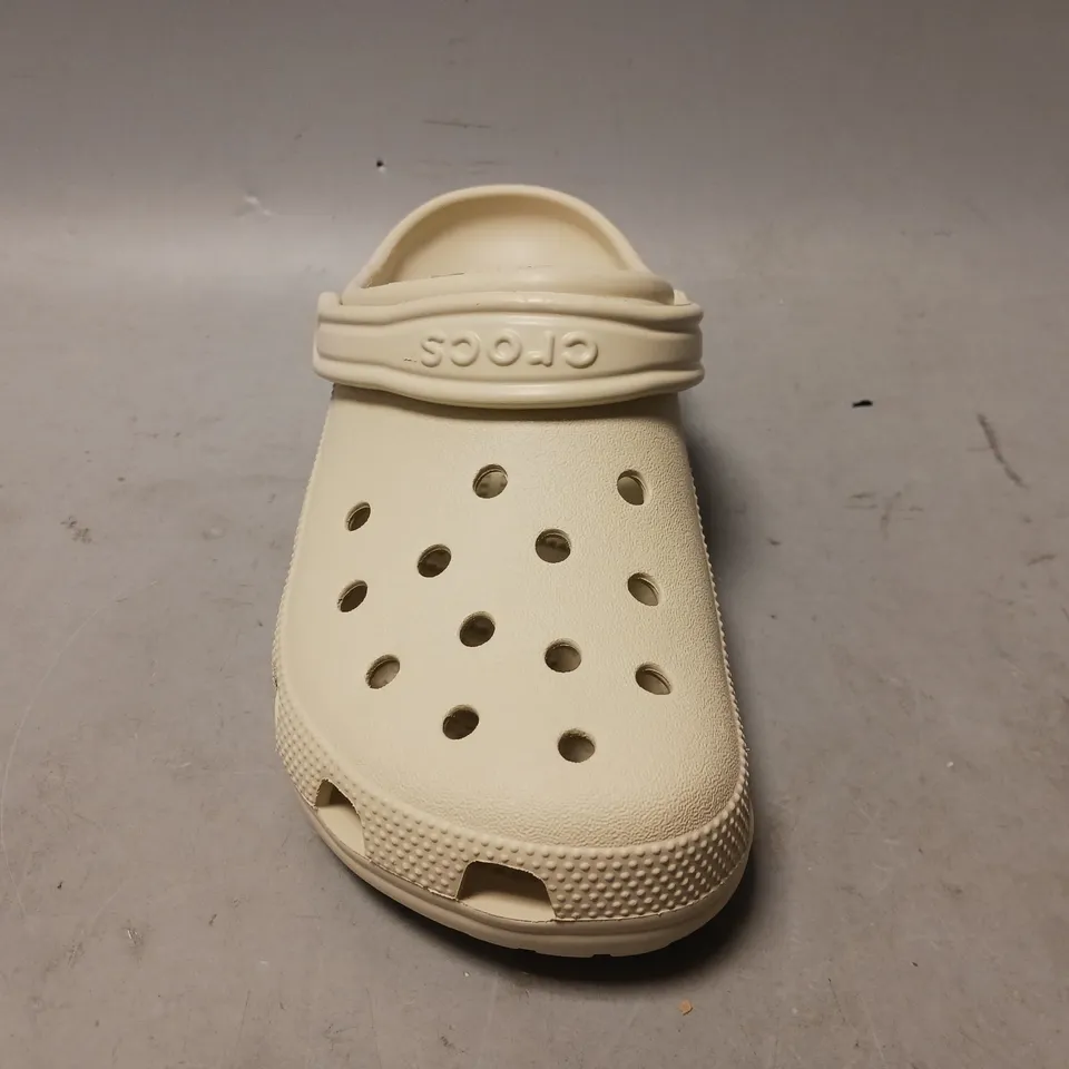 PAIR OF CROCS CLOGS IN BONE UK SIZE 7