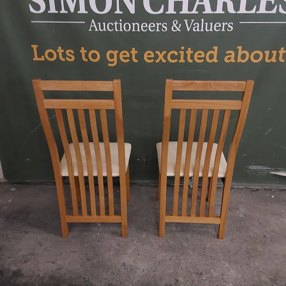 SET OF 2 BALI OAK DINING CHAIRS WITH IVORY SEAT PADS