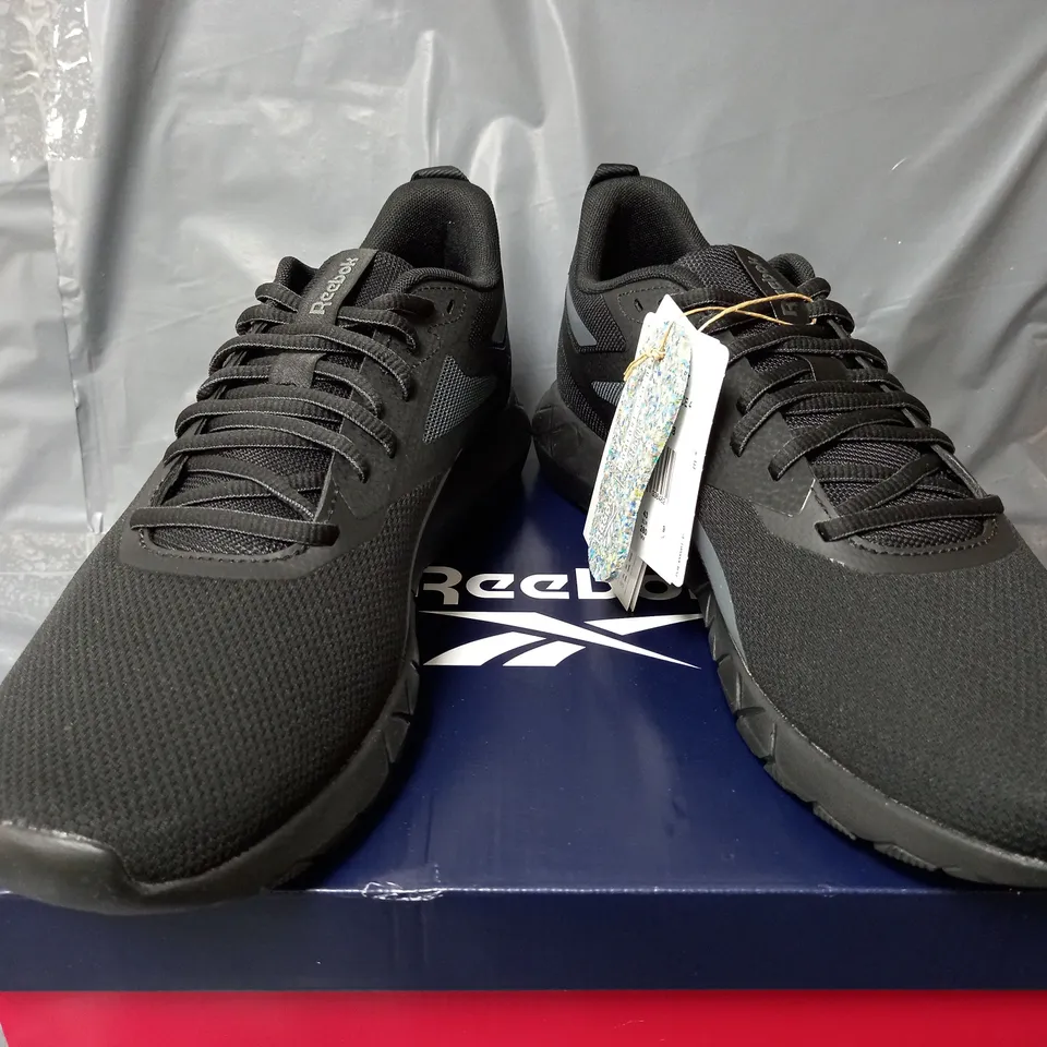 BOXED PAIR OF FLEXAGON FORCE 4 TRAINERS IN BLACK - UK 9